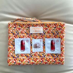 Shiseido x Tory Burch Wristlet with 3 Shiseido samples